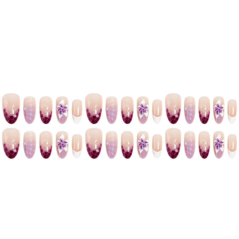 Artificial nail set with elegant ombre design and floral accents Bowlift
