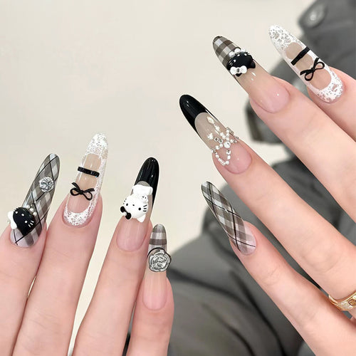 Artistic Press-On Nail Set with Floral and Heart Designs Bowlift
