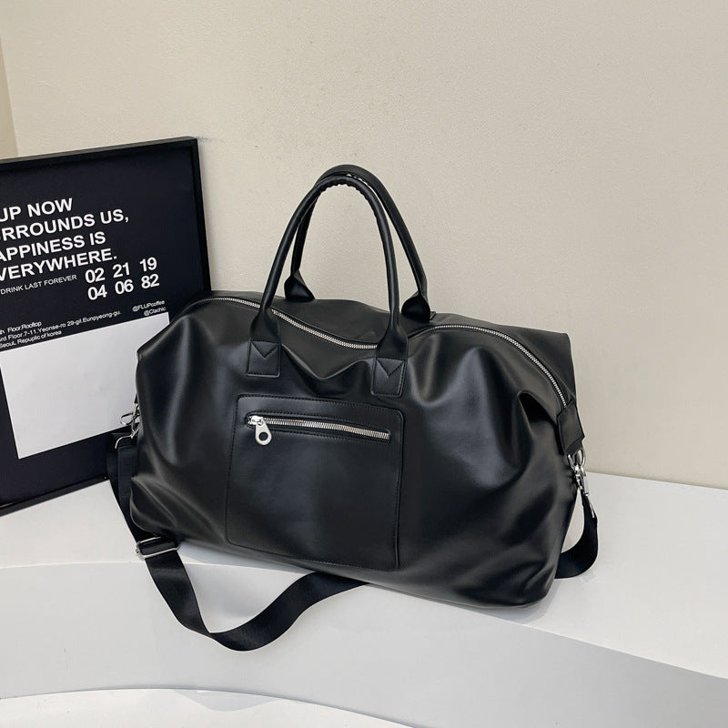 Stylish travel bag with robust design and adjustable shoulder strap Bowlift