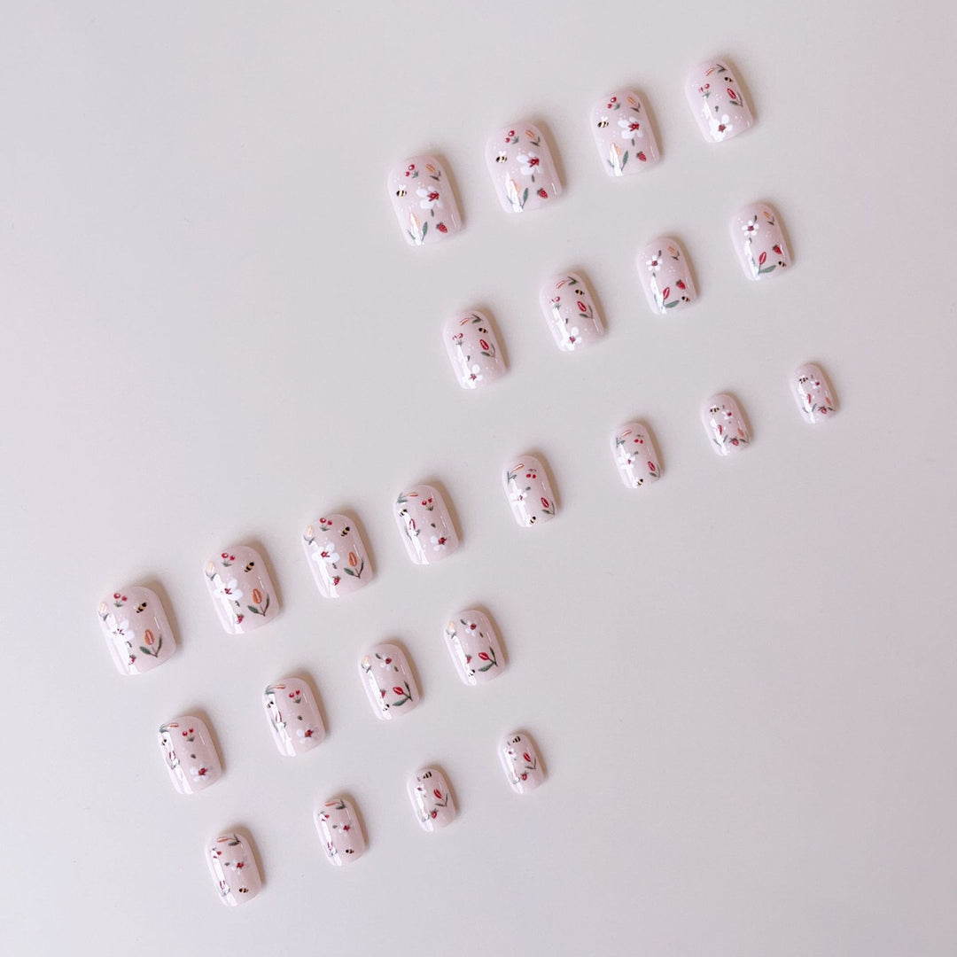 Artificial nail set with cheerful flower and bee designs Bowlift