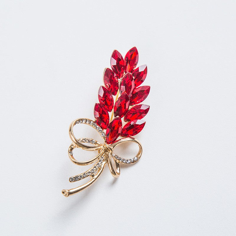 Elegante Brooch with Crystals Bowlift