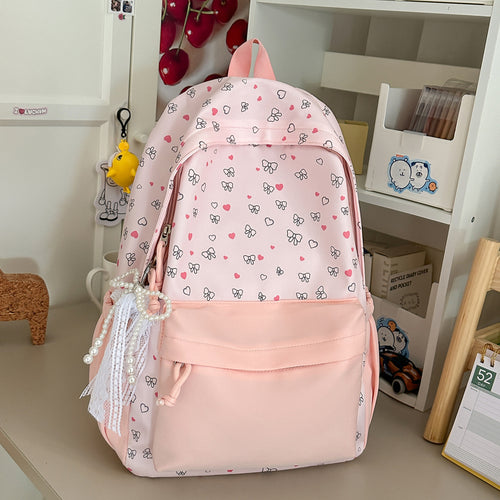 Playful Heart and Bow Patterned Backpack