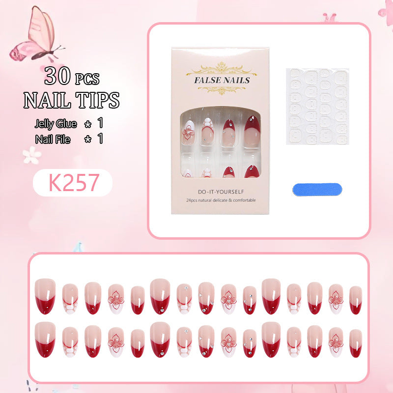 Artificial nails with floral and glittering accents Bowlift