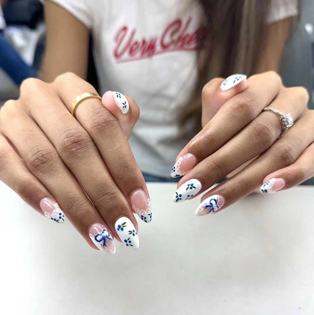 Artificial nails with charming flower and bow decor Bowlift