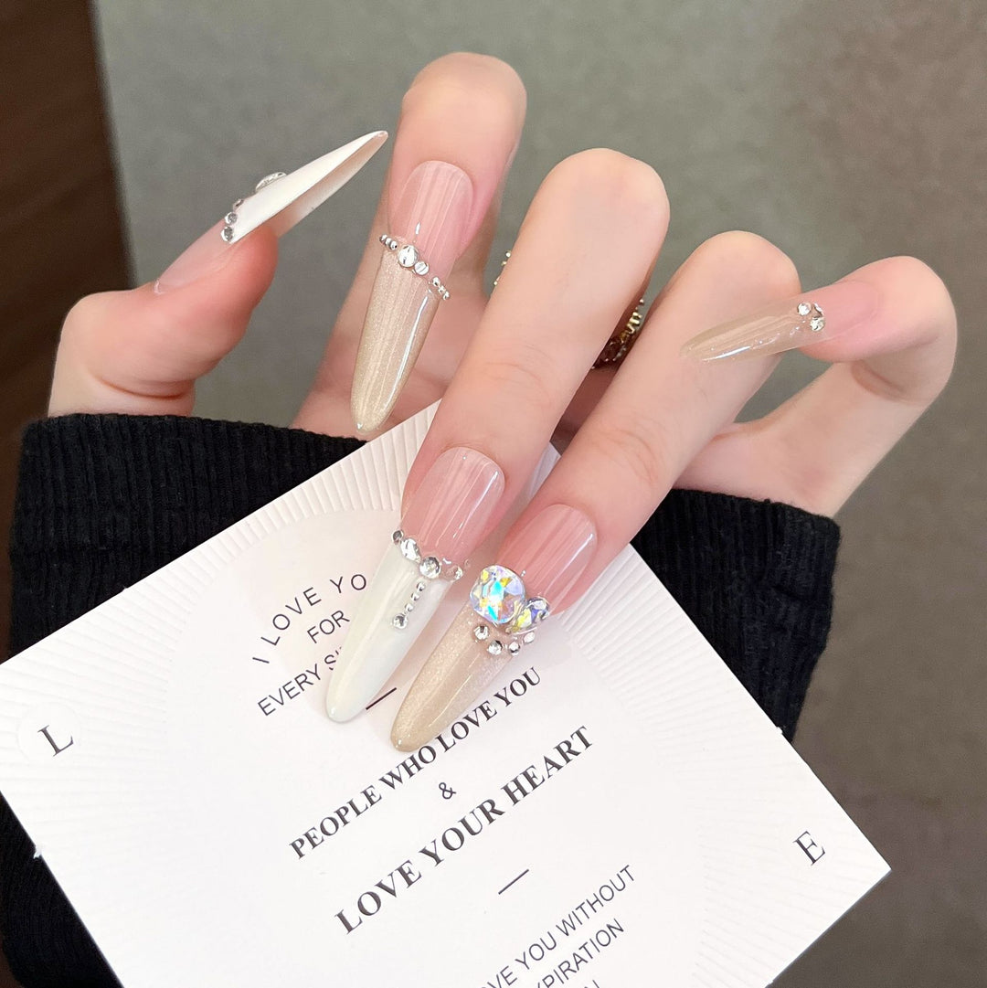 Artistic Stiletto Press-On Nail Art with Glimmering Accents Bowlift