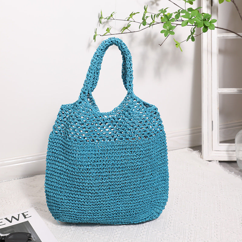 Handcrafted straw bag with wide carrying handle Bowlift