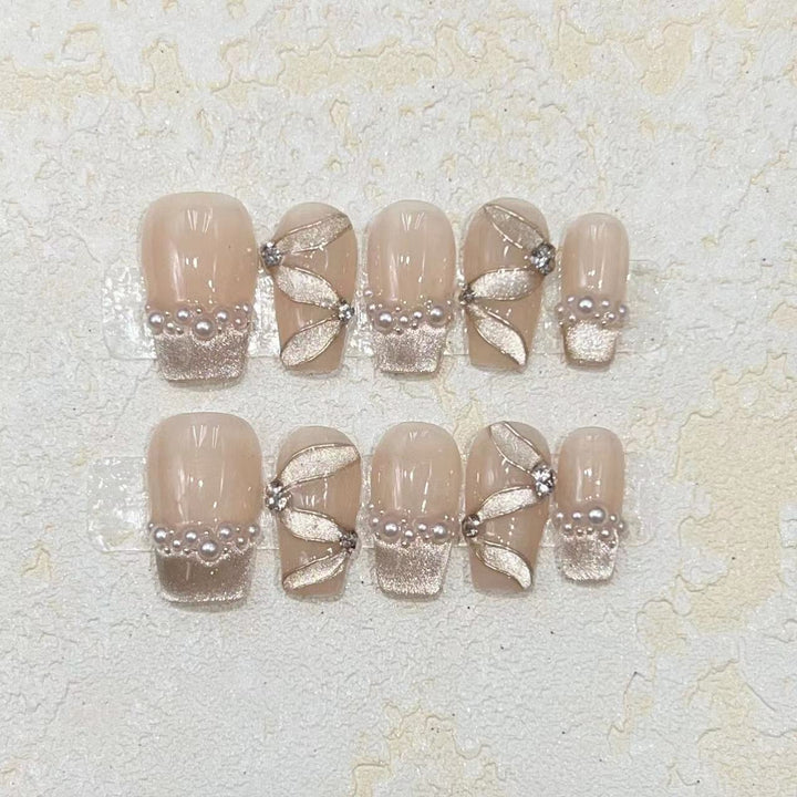 Luxurious Decorative Press-On Nail Set with Pearl and Gemstone Accents Bowlift