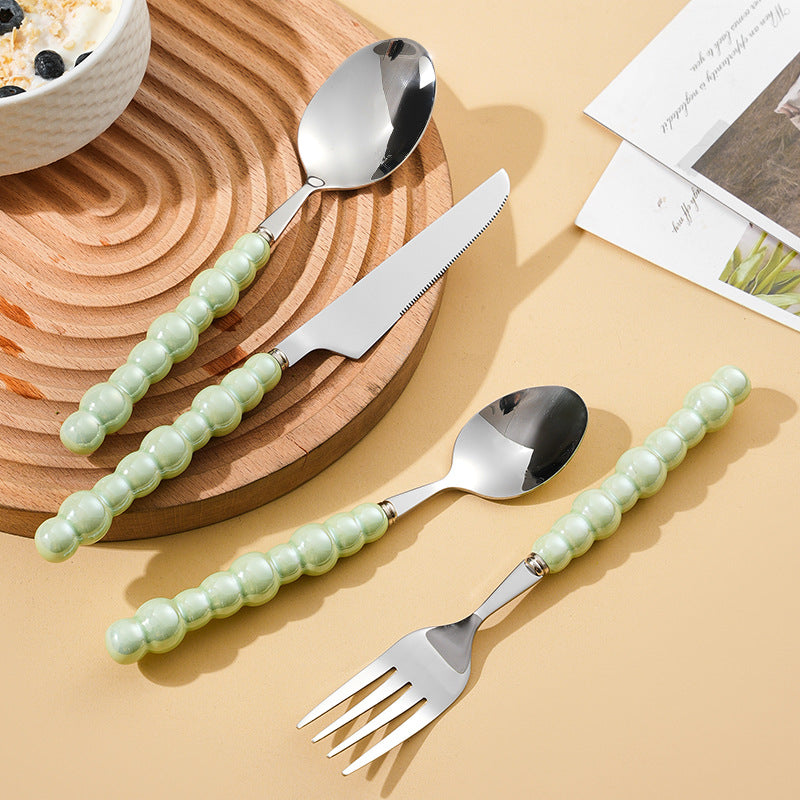 Elegant finger food fork with non-slip handle Bowlift