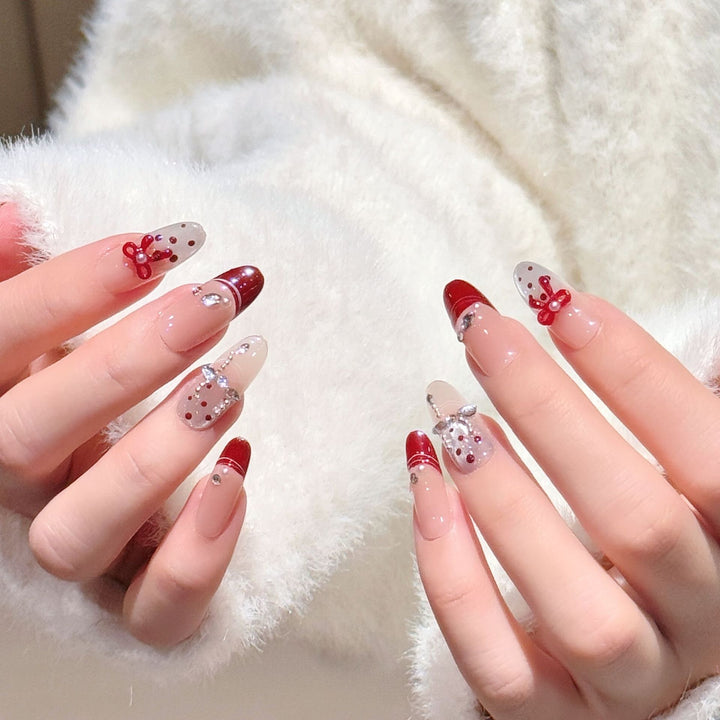Artistic Press-On Nail Extensions with Gem Accents Bowlift