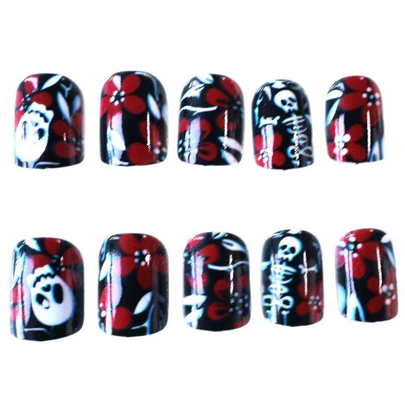 Artificial nail set with creepy skull design and floral accents Bowlift
