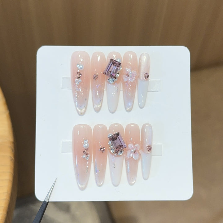 Artificial nails with elegant jewelry details Bowlift