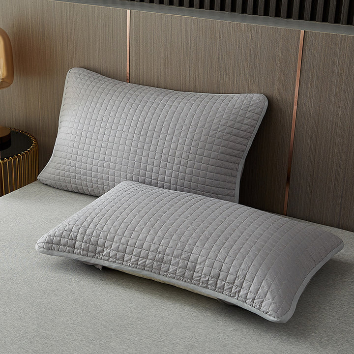 Quilted breathable zippered pillow protector with hypoallergenic padding Bowlift