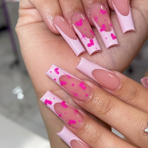 Artful Nail Extensions with Heart-Shaped Accents Bowlift