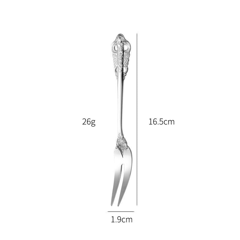 Elegant fish fork with artistic handle design Bowlift
