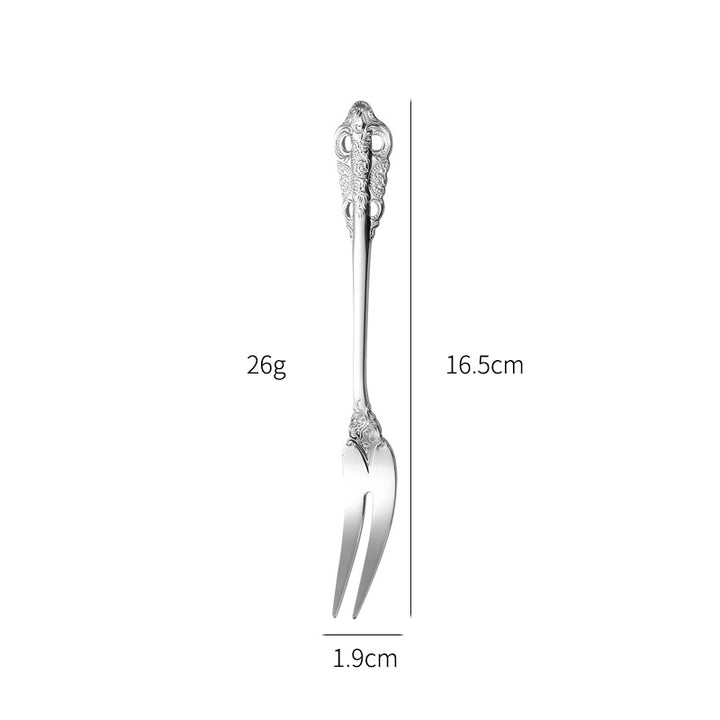 Elegant fish fork with artistic handle design Bowlift