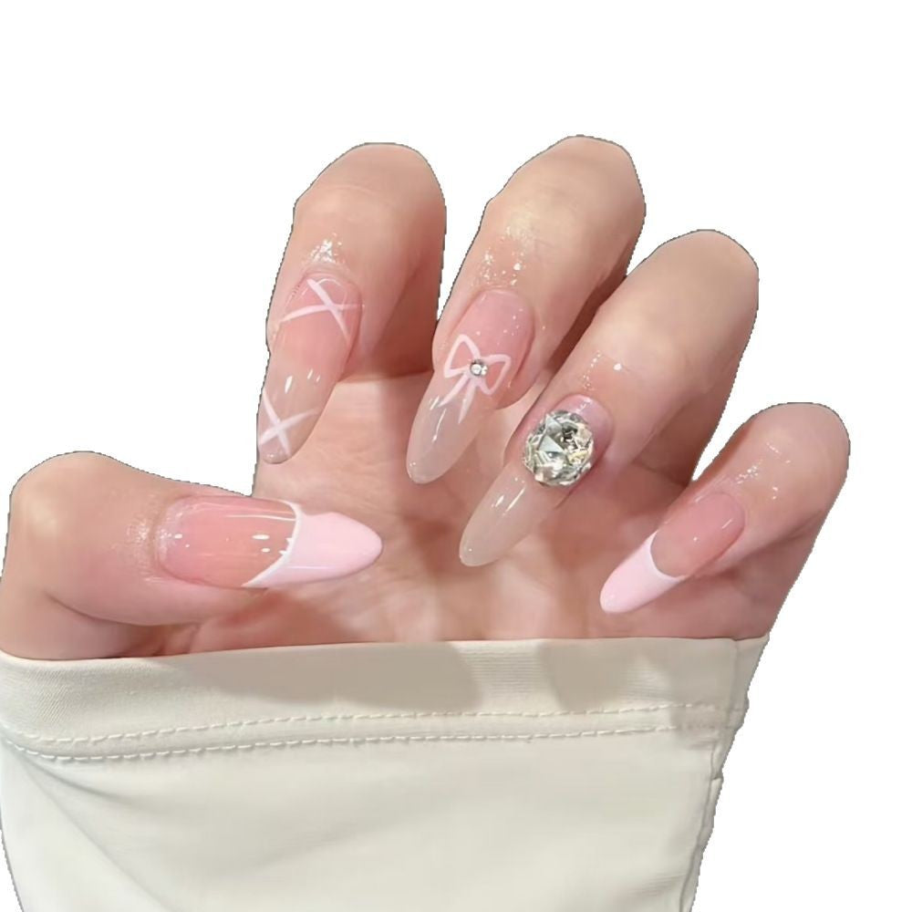 Decorative Press-On Nail Extensions with Bow and Rhinestone Accents Bowlift