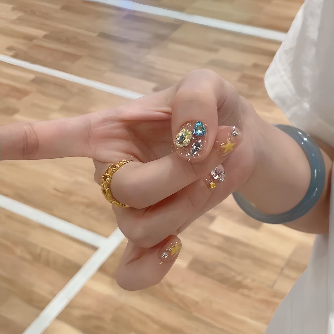 Glittering nail tips with elegant jewelry accents Bowlift