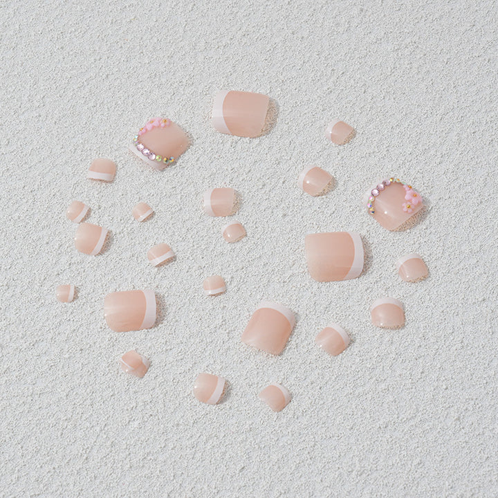 Elegant toenail art with delicate 3D floral decorations Bowlift