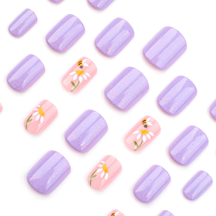 Artfully designed nail extensions with flower design Bowlift
