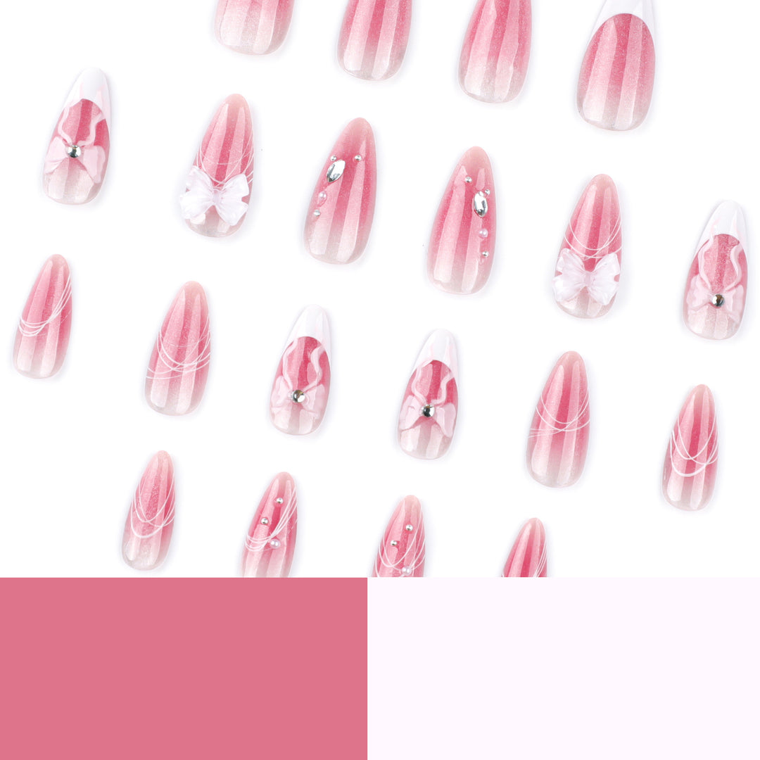 Artful acrylic nails with floral design and glitter embellishment Bowlift