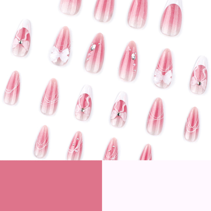 Artful acrylic nails with floral design and glitter embellishment Bowlift