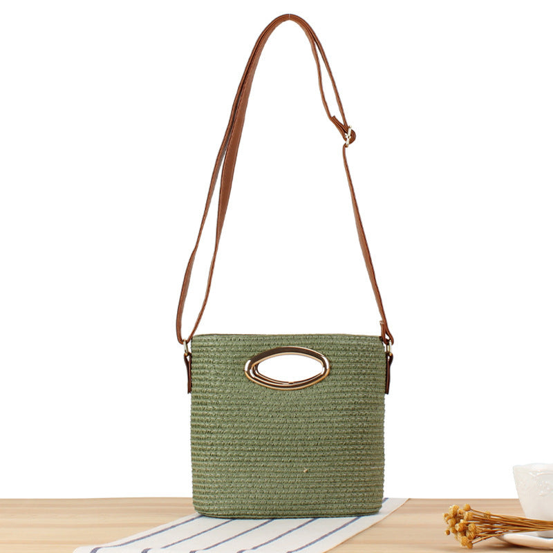 Shoulder bag made of handwoven natural material with elegant handle Bowlift