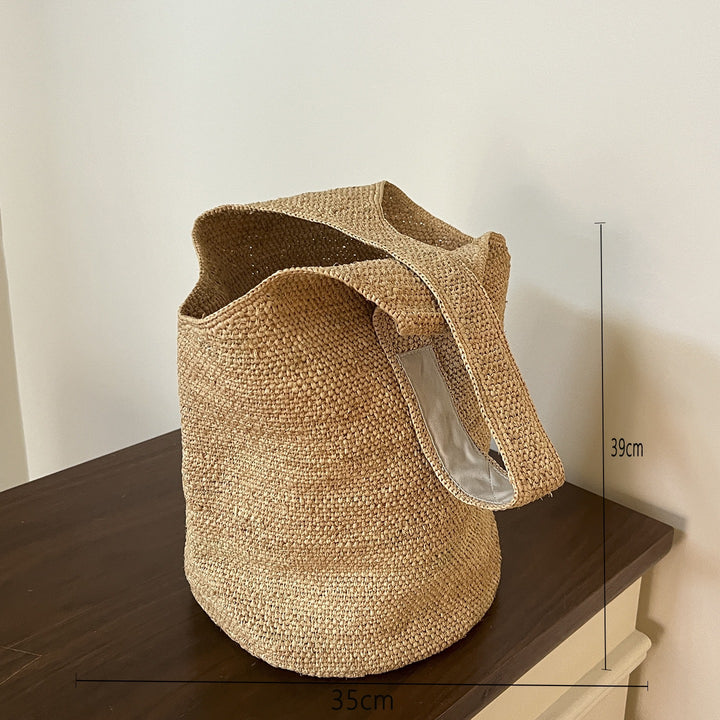Handmade basket bag with braided handle Bowlift