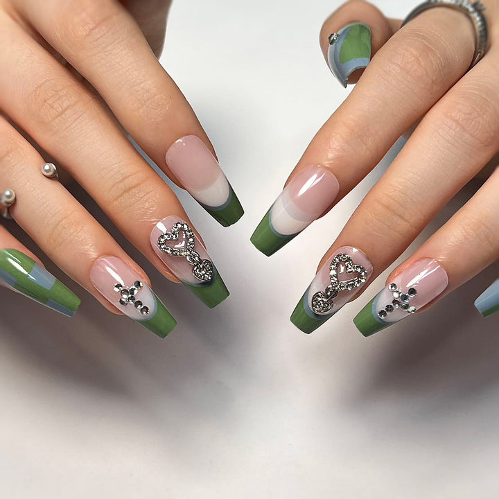 Artistic nail extensions with decorative jewelry effect Bowlift