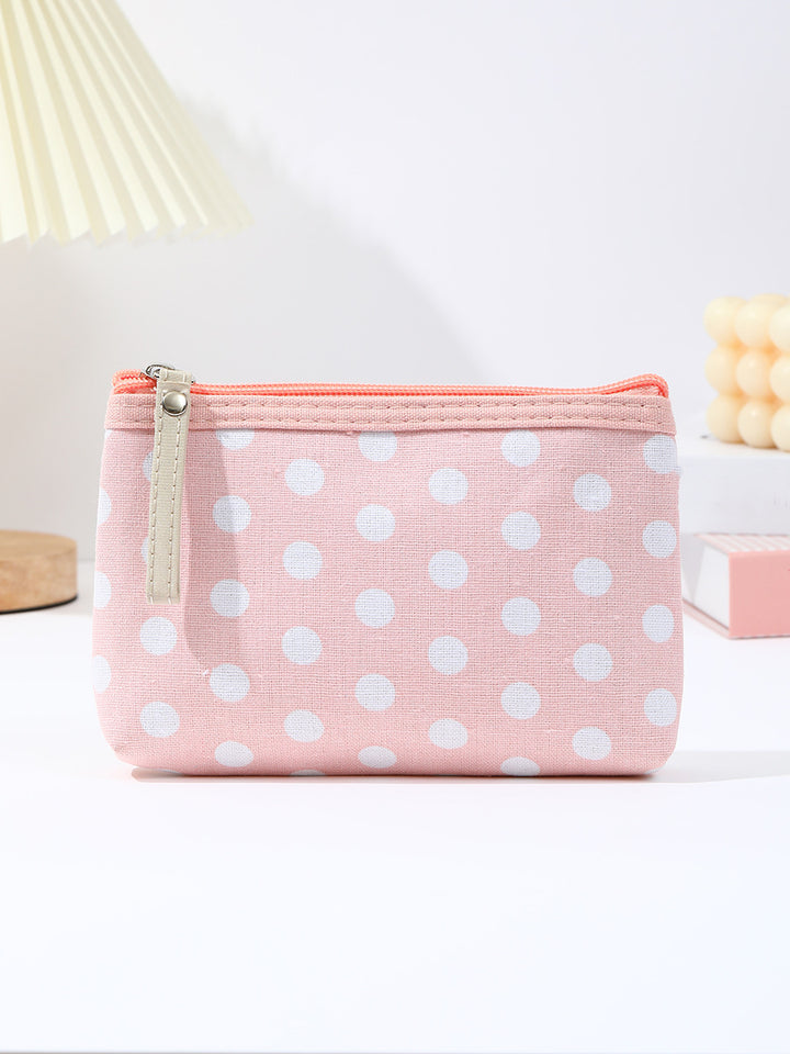 Polka dot canvas cosmetic pouch with top zipper and leather pull Bowlift