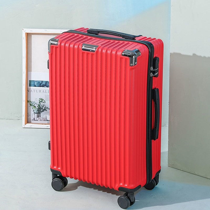 Hard shell suitcase with 360-degree wheel system and integrated safety feature Bowlift