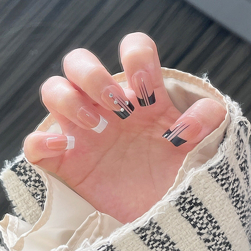 Elegant Press-On Nail Set with Artistic Design Bowlift