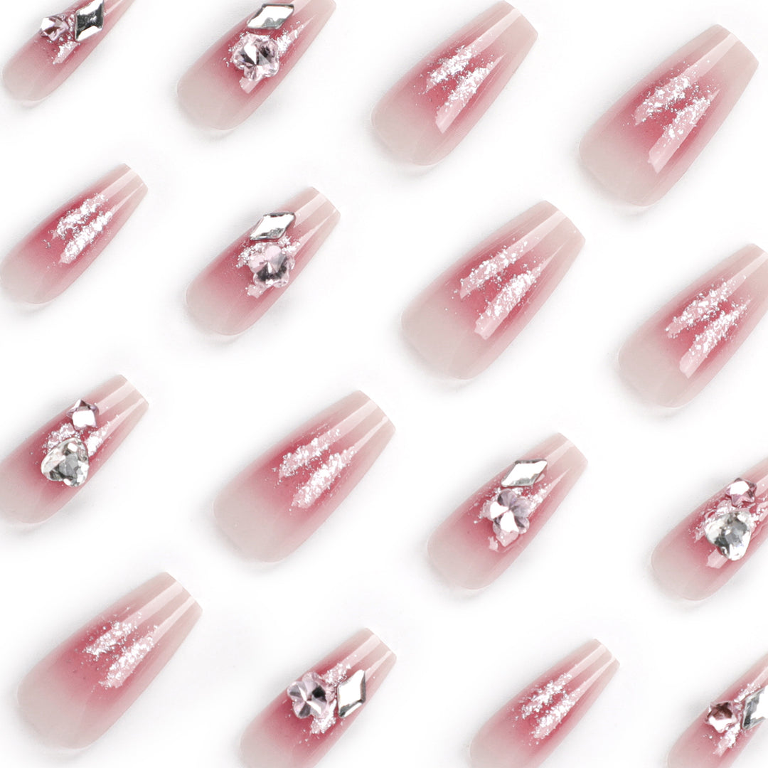 Glamorous artificial nails with glitter and crystal embellishment Bowlift