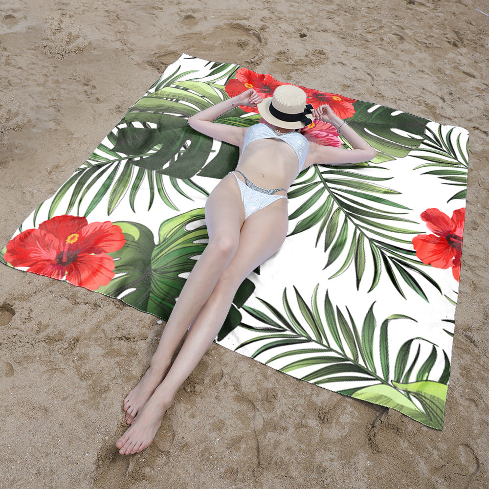 Beach blanket with tropical floral design Bowlift