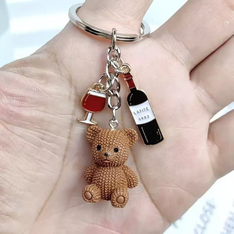 Playful keychain with bears and drink Bowlift