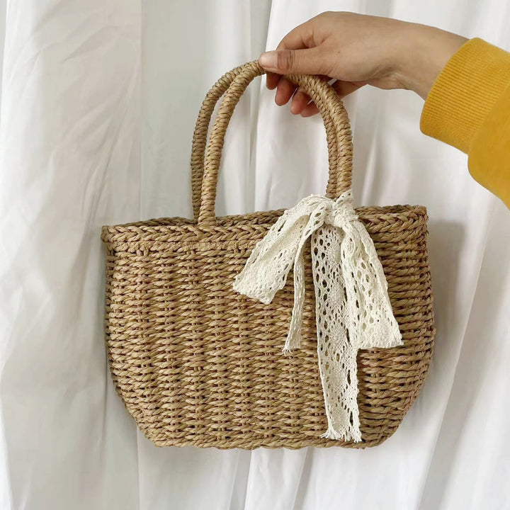 Handwoven basket bag with elegant bow Bowlift