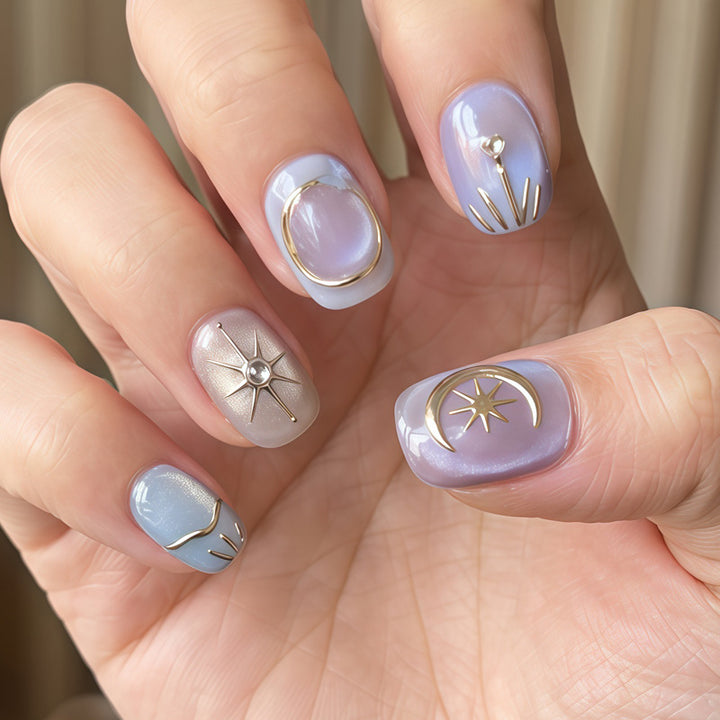 Artistic Press-On Nail Set with Decorative Celestial Designs Bowlift