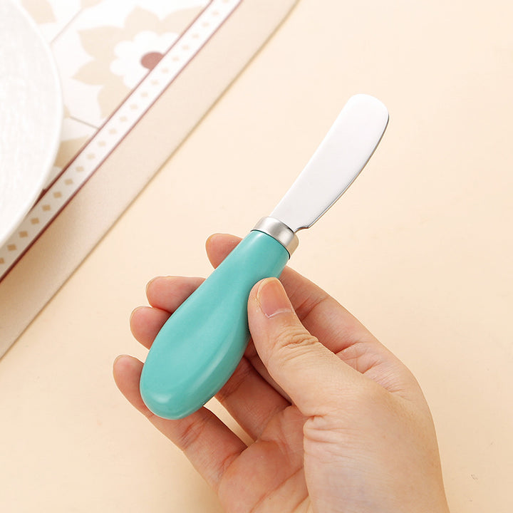 Elegant spreader knife with ergonomic handle Bowlift