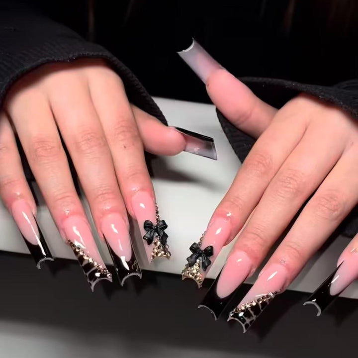 Artificial nail set with elegant tips and glamorous accents Bowlift