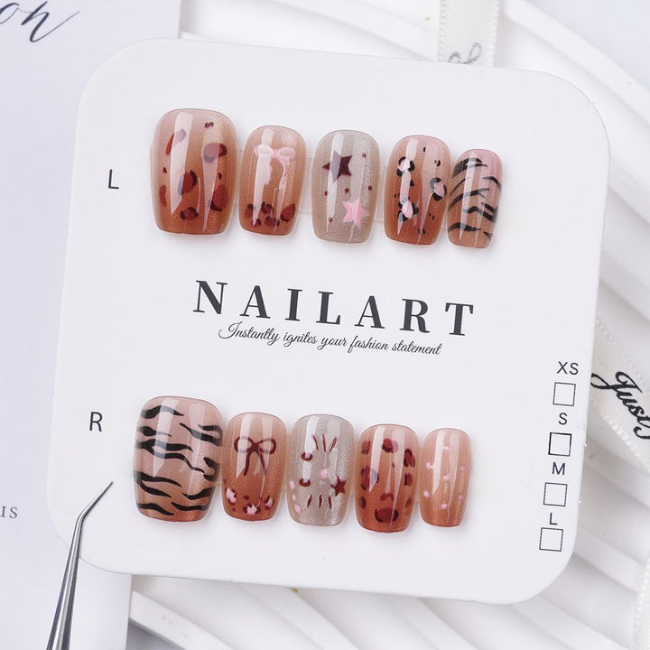 Artistic Stiletto Press-On Nail Set with Floral Embellishments Bowlift