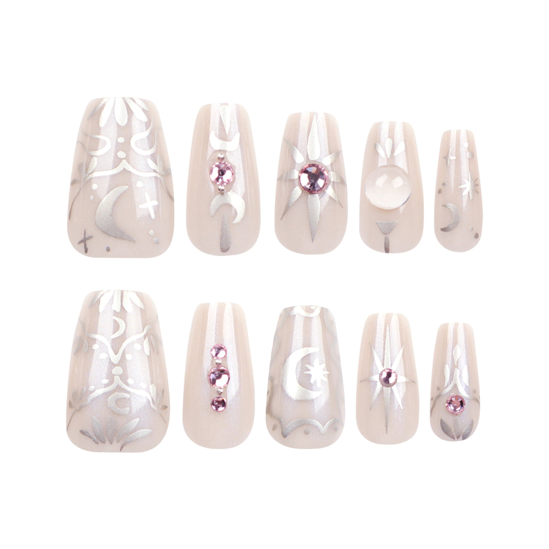 Artificial nail art with elegant rhinestone and glitter effects Bowlift