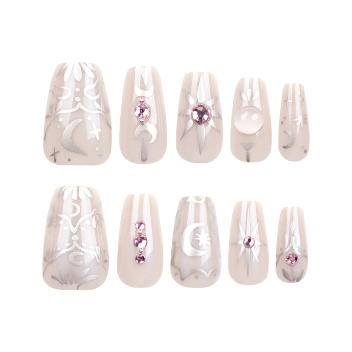 Artificial nail art with elegant rhinestone and glitter effects Bowlift