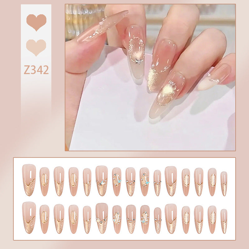 Art nail set with elegant gold glitter design Bowlift