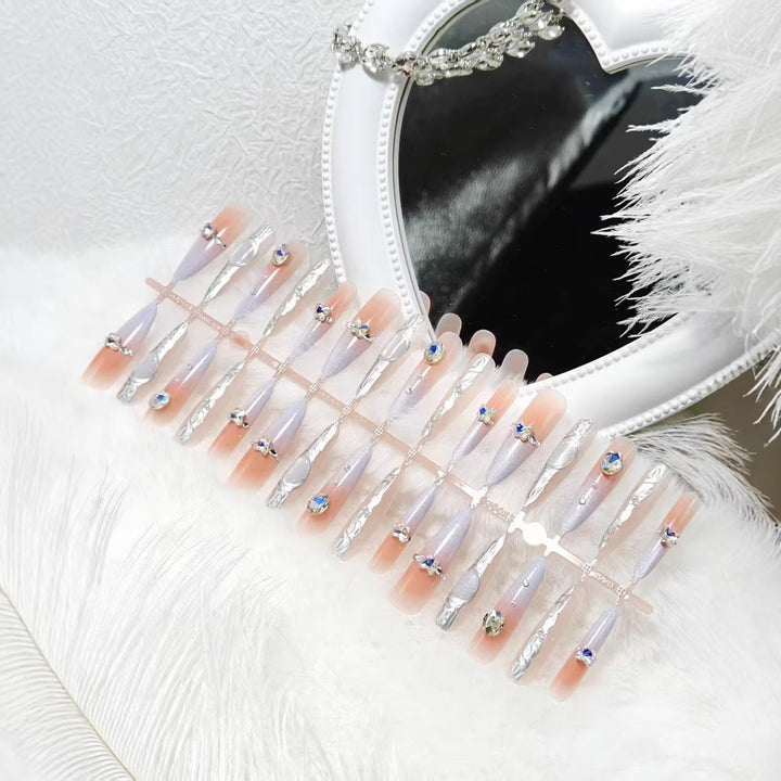 Artificial nails with elegant glitter design and fine 3D decorations Bowlift