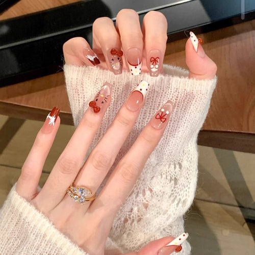 Artistic Press-On Nail Set with Whimsical Holiday Designs Bowlift