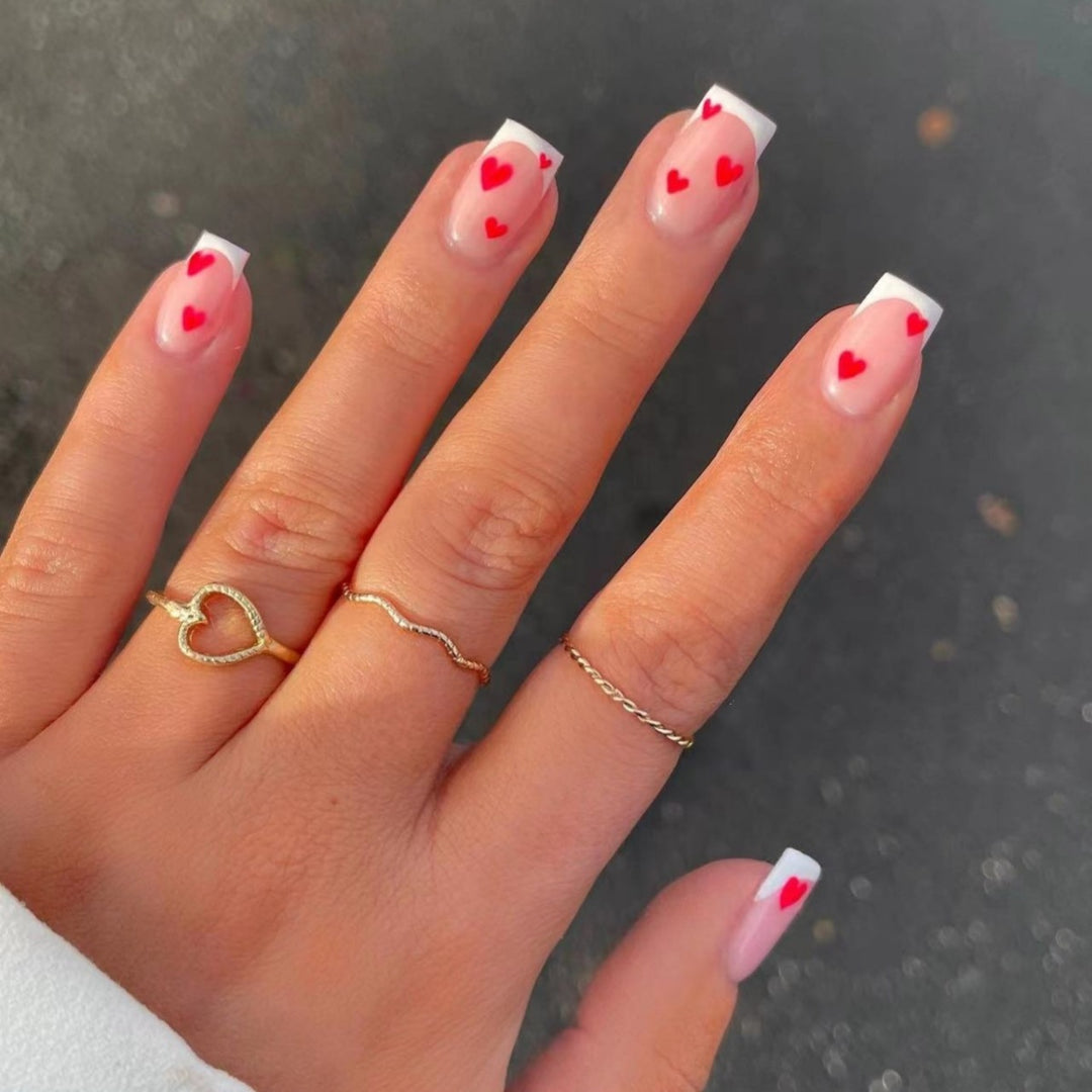 Heart-Embellished French Tip Nail Art Bowlift