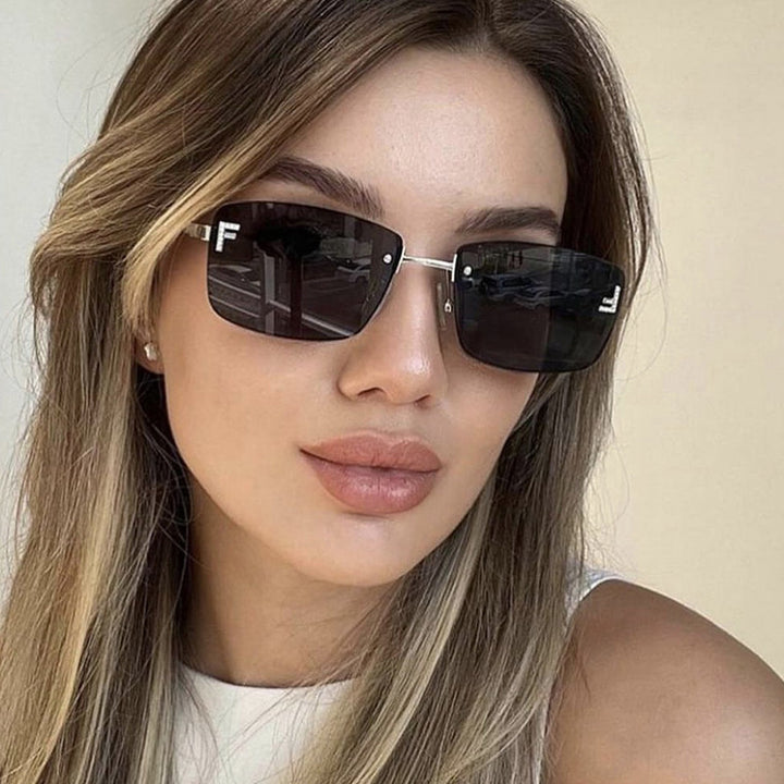 Ladies square sunglasses with elegant golden frame and stylish lenses Bowlift