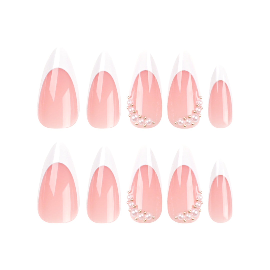 Artificial nail set with elegant French lace and pearl-decorated accents Bowlift