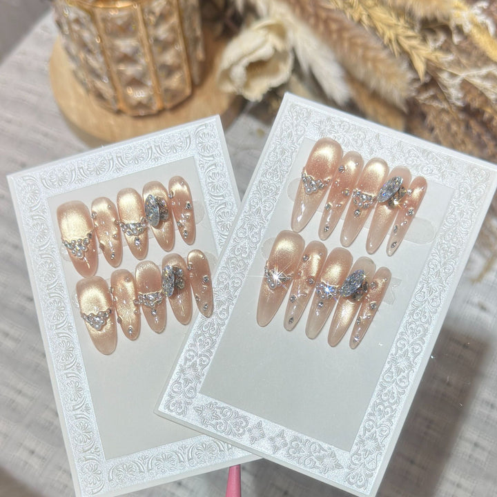 Elegant Stiletto Nail Art Set with Rhinestone and Glitter Detailing Bowlift