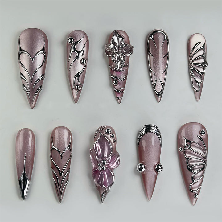 Artificial nails with filigree design Bowlift