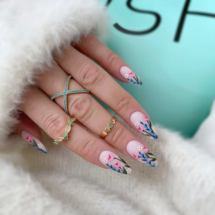 Artificial nail set with floral motifs and embellished accents Bowlift